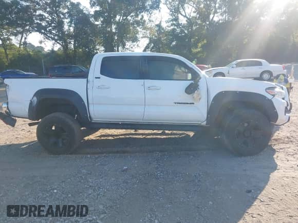 2021 Toyota Tacoma SR5 with VIN 3TMAZ5CN8MM152710, listed as a IAAI auction lot 43148239 with 40,000 mi miles and . Bid and sale history available at DreamBid. Image 13.