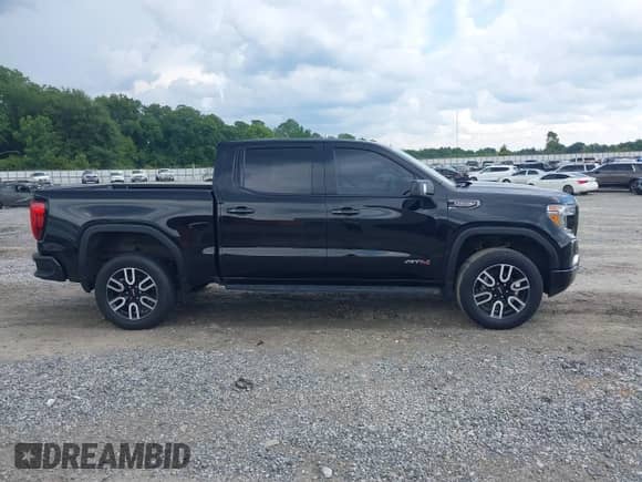 2021 GMC Sierra 1500 AT4 z VIN 3GTP9EEL5MG187421, wystawiony jako IAAI lot #42707618 z przebiegiem 60 936 mil mil oraz . Historia ofert i sprzedaży dostępna na DreamBid. Obrazek 13.