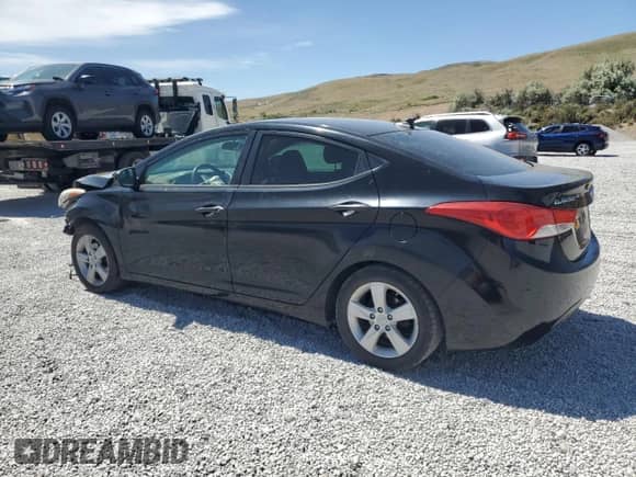 2013 Hyundai Elantra GLS with VIN KMHDH4AE8DU542971, listed as a Copart auction lot 61842835 with 244,922 mi miles and Salvage title. Bid and sale history available at DreamBid. Image 2.