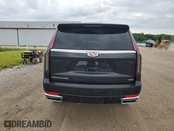2021 Cadillac Escalade Premium Luxury with VIN 1GYS4BKL4MR474562, listed as a Copart auction lot 62931635 with 59,641 mi miles and Salvage title. Bid and sale history available at DreamBid. Image 6.