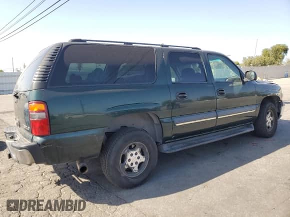 2003 Chevrolet Suburban LS с VIN 1GNEC16T93J134550, выставлен на аукционе Copart как лот 61409245 с пробегом 205 999 миль миль и Списание • Salvage title. История ставок и продаж доступна на DreamBid. Изображение 3.