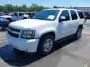 2014 Chevrolet Tahoe LS with VIN 1GNSCAE01ER191744, listed as a IAAI auction lot 43068276 with 275,886 mi miles and . Bid and sale history available at DreamBid. Image 2.