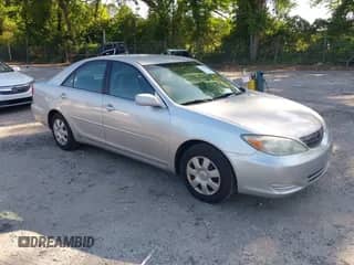 2002 Toyota Camry LE с VIN 4T1BE32K12U103879, выставлен на аукционе IAAI как лот 42328954 с пробегом 296 975 миль миль и . История ставок и продаж доступна на DreamBid. Изображение 1.