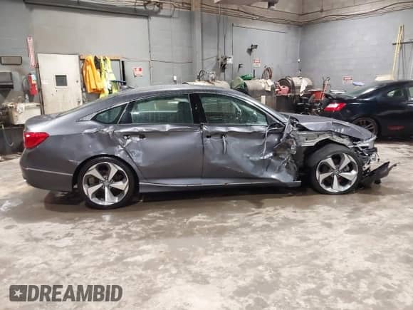 2019 Honda Accord Touring with VIN 1HGCV2F99KA031634, listed as a IAAI auction lot 41209019 with 74,965 mi miles and . Bid and sale history available at DreamBid. Image 13.