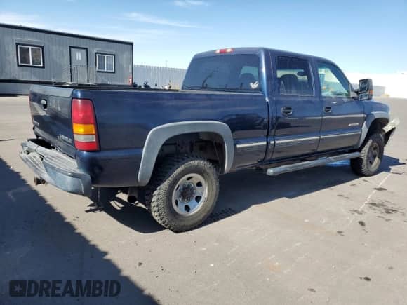 2002 Chevrolet Silverado 2500HD LS z VIN 1GCHK23G02F121208, wystawiony jako Copart lot #75267464 z przebiegiem 158 701 mil mil oraz Szkoda całkowita • Salvage title. Historia ofert i sprzedaży dostępna na DreamBid. Obrazek 3.
