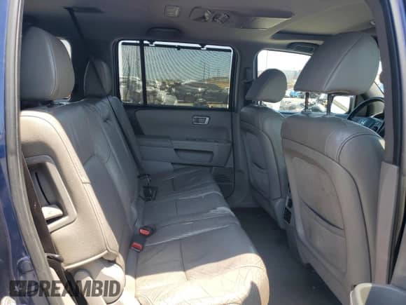 2013 Honda Pilot Touring с VIN 5FNYF3H98DB035897, выставлен на аукционе Copart как лот 64974205 с пробегом 104 739 миль миль и Списание • Salvage title. История ставок и продаж доступна на DreamBid. Изображение 11.