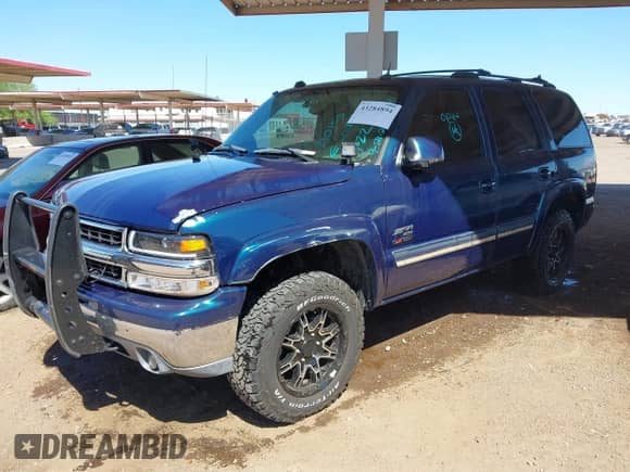 2005 Chevrolet Tahoe LS with VIN 1GNEK13T45J210153, listed as a IAAI auction lot 43284894 with 198,858 mi miles and . Bid and sale history available at DreamBid. Image 2.