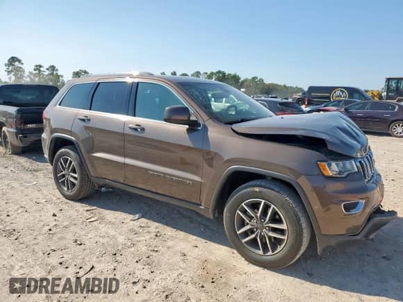 2020 Jeep Grand Cherokee Laredo E with VIN 1C4RJEAG4LC337254, listed as a Copart auction lot 80237845 with 81,163 mi miles and Salvage title. Bid and sale history available at DreamBid. Image 4.