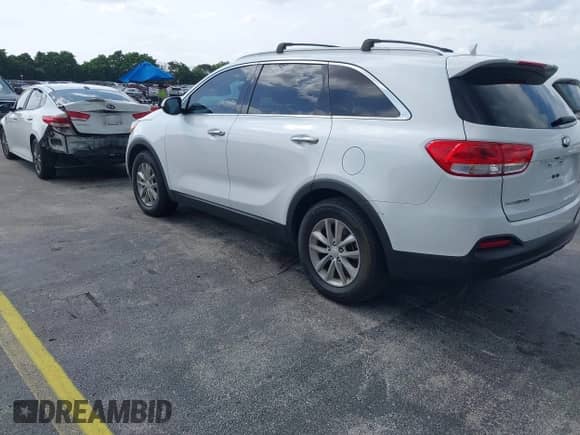 2016 Kia Sorento L with VIN 5XYPG4A39GG091994, listed as a IAAI auction lot 43068521 with 114,776 mi miles and . Bid and sale history available at DreamBid. Image 3.