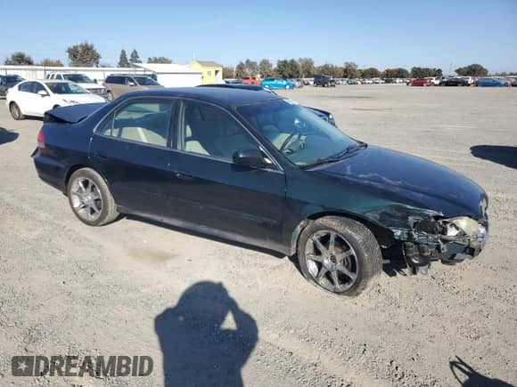 2001 Honda Accord with VIN JHMCG65581C013576, listed as a Copart auction lot 77839024 with 308,265 mi miles and Salvage title. Bid and sale history available at DreamBid. Image 4.