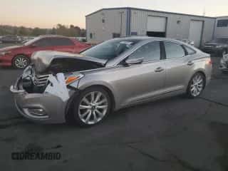 2013 Hyundai Azera с VIN KMHFH4JG7DA203159, выставлен на аукционе Copart как лот 77546384 с пробегом 163 509 миль миль и Списание • Salvage title. История ставок и продаж доступна на DreamBid. Изображение 1.