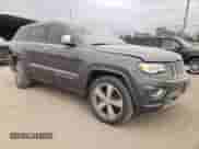 2016 Jeep Grand Cherokee High Altitude with VIN 1C4RJECG4GC314575, listed as a Copart auction lot 84265744 with 129,144 mi miles and Salvage title. Bid and sale history available at DreamBid. Image 4.