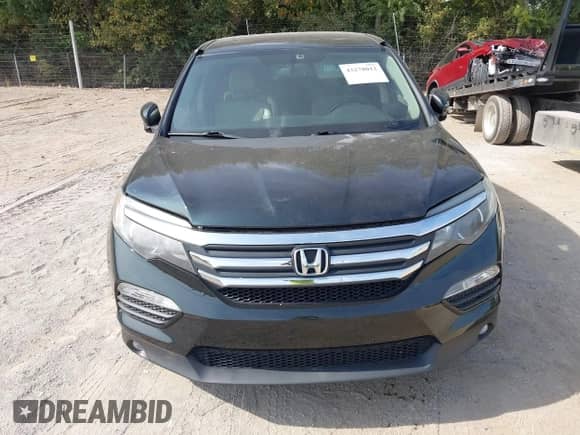 2016 Honda Pilot EX-L with VIN 5FNYF6H81GB027850, listed as a IAAI auction lot 43278012 with 172,404 mi miles and . Bid and sale history available at DreamBid. Image 6.