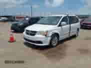 2014 Dodge Grand Caravan SXT 30th Anniversary with VIN 2C4RDGCG3ER127996, listed as a IAAI auction lot 42743916 with 15,988 mi miles and . Bid and sale history available at DreamBid. Image 2.
