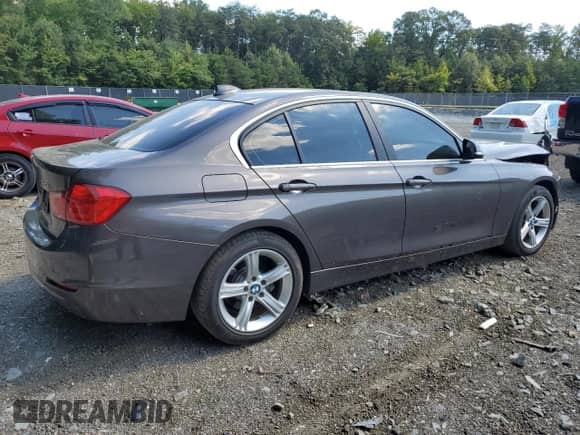 2015 BMW 3 Series 328i with VIN WBA3A5C5XFF607380, listed as a Copart auction lot 70839195 with 61,697 mi miles and Salvage title. Bid and sale history available at DreamBid. Image 3.