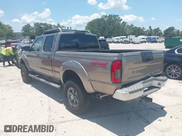 2003 Nissan Frontier XE z VIN 1N6ED29Y03C450987, wystawiony jako IAAI lot #42600507 z przebiegiem 143 488 mil mil oraz . Historia ofert i sprzedaży dostępna na DreamBid. Obrazek 3.