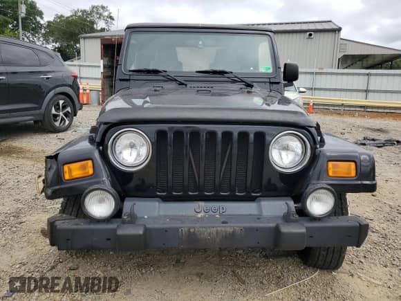 2004 Jeep Wrangler Sahara с VIN 1J4FA59S14P775827, выставлен на аукционе Copart как лот 69401485 с пробегом 64 116 миль миль и Списание • Salvage title. История ставок и продаж доступна на DreamBid. Изображение 5.