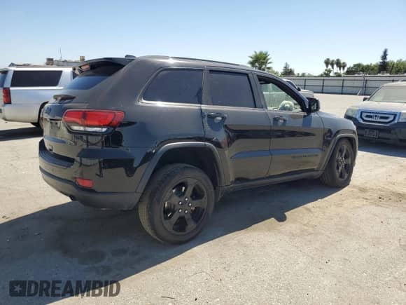 2018 Jeep Grand Cherokee Upland z VIN 1C4RJFAG5JC389933, wystawiony jako Copart lot #63147265 z przebiegiem 83 209 mil mil oraz Szkoda całkowita • Salvage title. Historia ofert i sprzedaży dostępna na DreamBid. Obrazek 3.