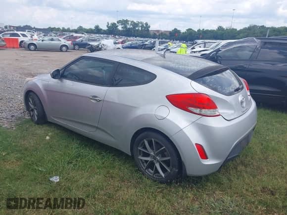 2012 Hyundai Veloster w/Black Int с VIN KMHTC6AD7CU042053, выставлен на аукционе IAAI как лот 42785973 с пробегом 164 030 миль миль и . История ставок и продаж доступна на DreamBid. Изображение 3.