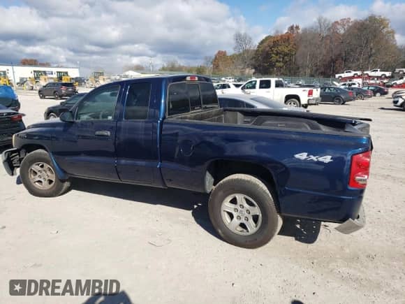 2005 Dodge Dakota SLT with VIN 1D7HW42K75S278967, listed as a Copart auction lot 58706885 with 128,619 mi miles and Salvage title. Bid and sale history available at DreamBid. Image 2.