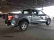 2023 Ford F-150 with VIN 1FTFW1P89PKD31166, listed as a Copart auction lot 84958565 with 50,773 mi miles and Salvage title. Bid and sale history available at DreamBid. Image 3.