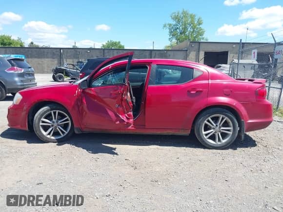 2011 Dodge Avenger Heat with VIN 1B3BD1FG0BN595981, listed as a IAAI auction lot 42793839 with 143,400 mi miles and . Bid and sale history available at DreamBid. Image 15.