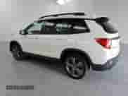 2019 Honda Passport Touring with VIN 5FNYF8H91KB017834, listed as a Copart auction lot 63452555 with 69,998 mi miles and Clean title. Bid and sale history available at DreamBid. Image 2.