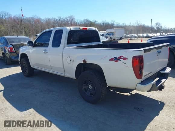 2012 Chevrolet Colorado Work Truck z VIN 1GCJTBFE8C8165200, wystawiony jako IAAI lot #41900797 z przebiegiem 101 023 mil mil oraz . Historia ofert i sprzedaży dostępna na DreamBid. Obrazek 3.