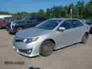 2014 Toyota Camry SE with VIN 4T1BF1FK9EU404237, listed as a IAAI auction lot 42948664 with 226,429 mi miles and . Bid and sale history available at DreamBid. Image 18.