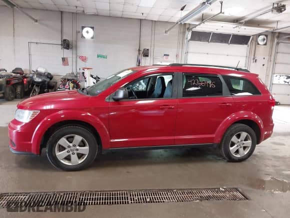 2014 Dodge Journey SE z VIN 3C4PDDAG5ET291031, wystawiony jako IAAI lot #42766496 z przebiegiem 227 965 mil mil oraz . Historia ofert i sprzedaży dostępna na DreamBid. Obrazek 12.