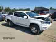 2019 Chevrolet Colorado 2WD Work Truck z VIN 1GCGSBEN6K1357902, wystawiony jako Copart lot #87193955 z przebiegiem 140 377 mil mil oraz Szkoda całkowita • Salvage title. Historia ofert i sprzedaży dostępna na DreamBid. Obrazek 4.