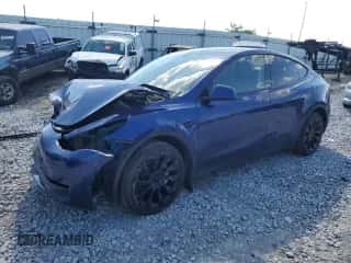 2023 Tesla Model Y Long Range with VIN 7SAYGDEEXPF749820, listed as a Copart auction lot 58756274 with 11,207 mi miles and Salvage title. Bid and sale history available at DreamBid. Image 1.