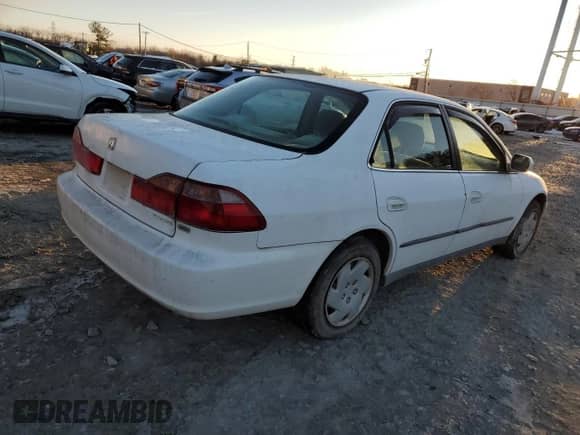 1999 Honda Accord LX with VIN 1HGCG1644XA068753, listed as a Copart auction lot 87135784 with 74,386 mi miles and Clean title. Bid and sale history available at DreamBid. Image 3.