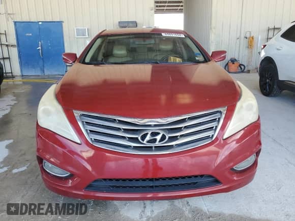 2013 Hyundai Azera с VIN KMHFG4JG1DA219568, выставлен на аукционе Copart как лот 69891694 с пробегом 212 240 миль миль и Чистый • Clean title. История ставок и продаж доступна на DreamBid. Изображение 5.