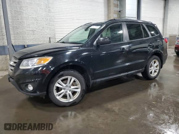 2012 Hyundai Santa Fe SE with VIN 5XYZH4AG5CG145746, listed as a Copart auction lot 65472855 with 243,687 mi miles and Salvage title. Bid and sale history available at DreamBid. Image 1.