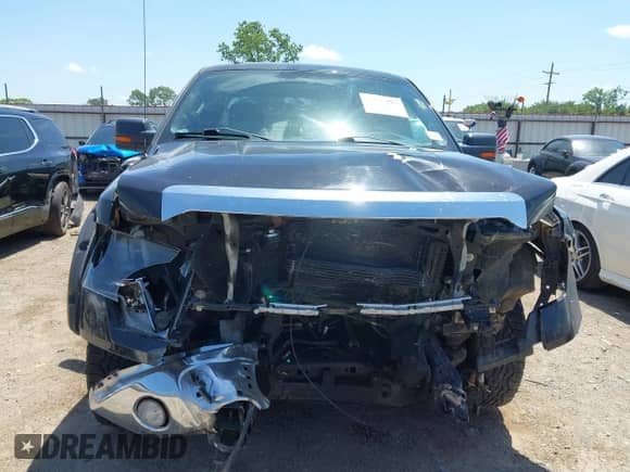 2013 Ford F-150 Lariat with VIN 1FTFW1ET9DKE25809, listed as a IAAI auction lot 42531919 with 247,445 mi miles and . Bid and sale history available at DreamBid. Image 13.