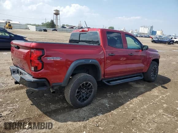 2023 Chevrolet Colorado 4WD Trail Boss с VIN 1GCPTEEK8P1191457, выставлен на аукционе Copart как лот 68494325 с пробегом 23 590 миль миль и Списание • Salvage title. История ставок и продаж доступна на DreamBid. Изображение 3.