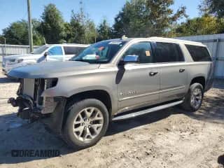 2017 Chevrolet Suburban Premier z VIN 1GNSCJKC4HR360707, wystawiony jako Copart lot #89694305 z przebiegiem 119 269 mil mil oraz Szkoda całkowita • Salvage title. Historia ofert i sprzedaży dostępna na DreamBid. Obrazek 1.