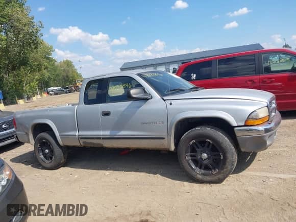 2001 Dodge Dakota Sport with VIN 1B7GG22N11S128929, listed as a IAAI auction lot 43228896 with 267,995 mi miles and . Bid and sale history available at DreamBid. Image 13.