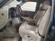 2001 Chevrolet Silverado 1500 LS z VIN 1GCEK19T81E219084, wystawiony jako Copart lot #80954195 z przebiegiem 216 520 mil mil oraz Czysty tytuł • Clean title. Historia ofert i sprzedaży dostępna na DreamBid. Obrazek 7.