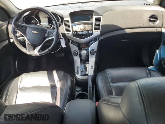 2012 Chevrolet Cruze 2LT z VIN 1G1PG5SC7C7252623, wystawiony jako Copart lot #84552125 z przebiegiem Nie podano mil oraz Szkoda całkowita • Salvage title. Historia ofert i sprzedaży dostępna na DreamBid. Obrazek 8.