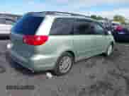 2009 Toyota Sienna XLE with VIN 5TDZK22C39S264912, listed as a IAAI auction lot 43385734 with 327,786 mi miles and . Bid and sale history available at DreamBid. Image 4.