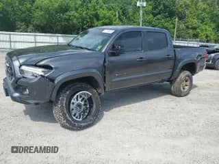 2017 Toyota Tacoma SR5 with VIN 3TMCZ5AN3HM081109, listed as a Copart auction lot 61154625 with 59,552 mi miles and Salvage title. Bid and sale history available at DreamBid. Image 1.