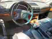 1994 BMW 7 Series с VIN WBAGD4326RDE68022, выставлен на аукционе Copart как лот 57808115 с пробегом 220 431 миль миль и Чистый • Clean title. История ставок и продаж доступна на DreamBid. Изображение 8.