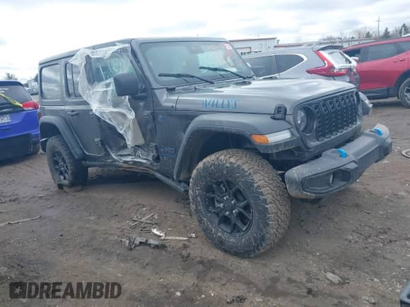 2024 Jeep Wrangler Sport S with VIN 1C4RJXN67RW215606, listed as a IAAI auction lot 41737708 with 8,863 mi miles and . Bid and sale history available at DreamBid. Image 1.