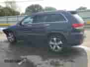 2015 Jeep Grand Cherokee Overland with VIN 1C4RJECG2FC872164, listed as a Copart auction lot 69685435 with 140,939 mi miles and Salvage title. Bid and sale history available at DreamBid. Image 2.