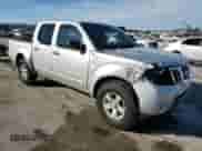 2013 Nissan Frontier Pro-4X z VIN 1N6AD0EV9DN738561, wystawiony jako Copart lot #83449914 z przebiegiem 207 407 mil mil oraz Szkoda całkowita • Salvage title. Historia ofert i sprzedaży dostępna na DreamBid. Obrazek 4.