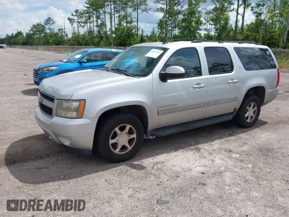 2011 Chevrolet Suburban LT with VIN 1GNSKJE39BR314960, listed as a IAAI auction lot 42697991 with 229,796 mi miles and . Bid and sale history available at DreamBid. Image 22.