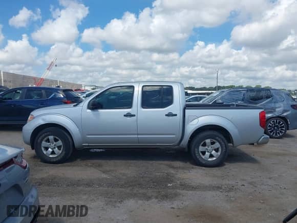 2013 Nissan Frontier SL with VIN 1N6AD0ER9DN761261, listed as a IAAI auction lot 42587067 with 240,063 mi miles and . Bid and sale history available at DreamBid. Image 14.