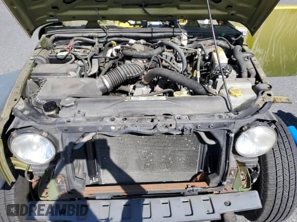 2008 Jeep Wrangler X z VIN 1J4FA24168L525400, wystawiony jako Copart lot #80185905 z przebiegiem 72 640 mil mil oraz Szkoda całkowita • Salvage title. Historia ofert i sprzedaży dostępna na DreamBid. Obrazek 11.